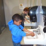 child care safety and health, image of children washing hands